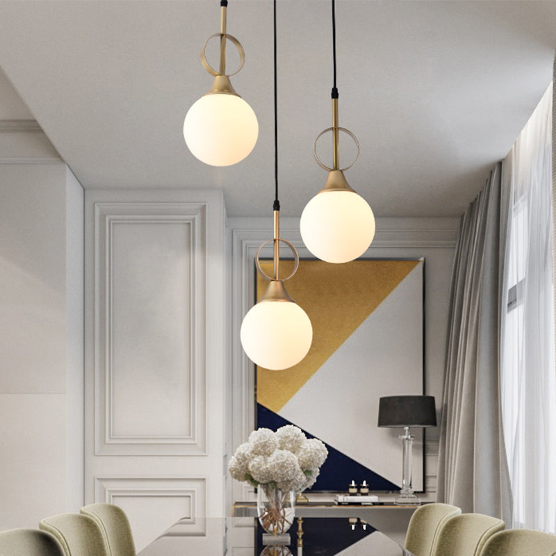 Minimalist Ball Hanging Lamp Kit Opal Glass Single Bedside Pendant with Ring Top in Black-Gold Clearhalo 'Ceiling Lights' 'Modern Pendants' 'Modern' 'Pendant Lights' 'Pendants' Lighting' 1125159