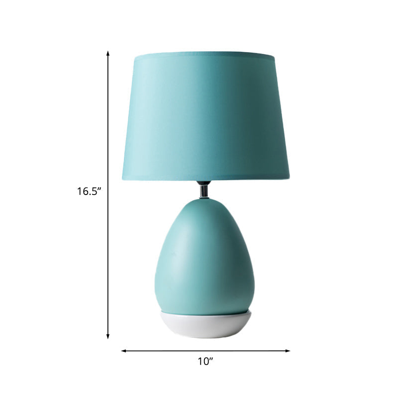 Egg-Shaped Bedside Night Light Modern Ceramic 1 Head Blue Table Stand Lamp with Drum Fabric Shade Clearhalo 'Lamps' 'Table Lamps' Lighting' 1136119