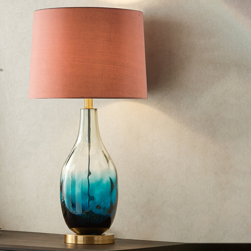Beige/Brown 1 Head Nightstand Lamp Contemporary Fabric Drum Table Lighting with Jar Fading Blue Glass Base Clearhalo 'Lamps' 'Table Lamps' Lighting' 1136557