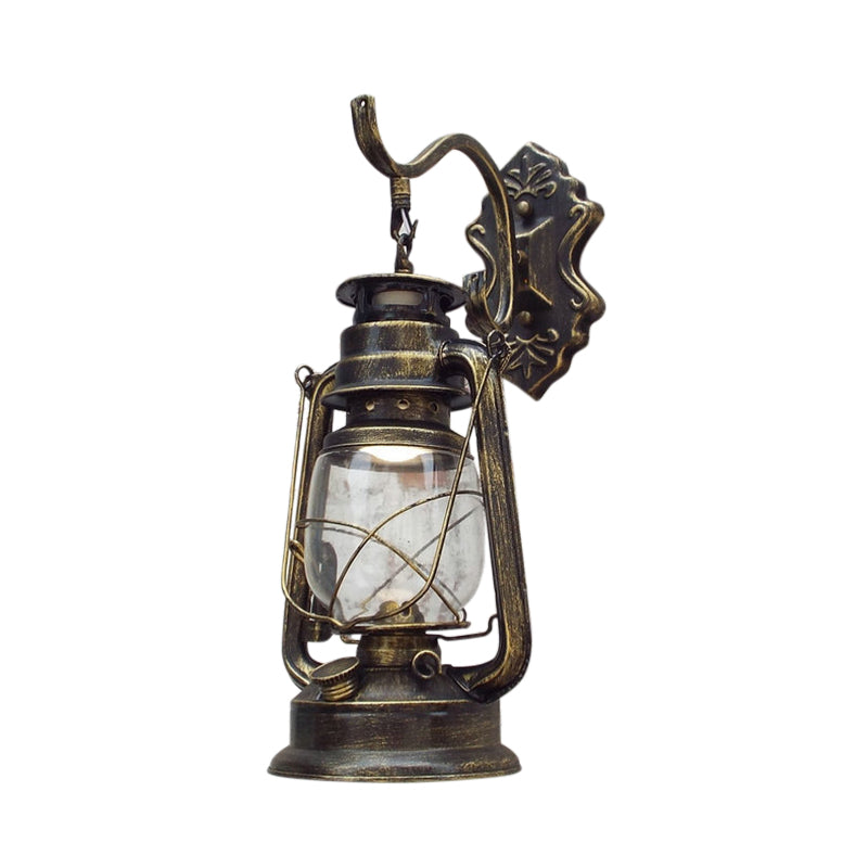 Clear Glass Black/Antique Brass Wall Sconce Lighting Lantern 1-Light Coastal Light Fixture for Porch Antique Brass Clearhalo 'Art deco wall lights' 'Cast Iron' 'Glass' 'Industrial wall lights' 'Industrial' 'Middle century wall lights' 'Modern' 'Rustic wall lights' 'Tiffany' 'Traditional wall lights' 'Wall Lamps & Sconces' 'Wall Lights' Lighting' 138775