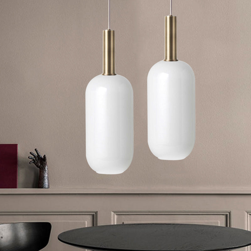 Opal Matte Glass Oblong Ceiling Pendant Minimalist 1 Light Brass Hanging Lamp Kit over Table Clearhalo 'Ceiling Lights' 'Glass shade' 'Glass' 'Modern Pendants' 'Modern' 'Pendant Lights' 'Pendants' Lighting' 1454898