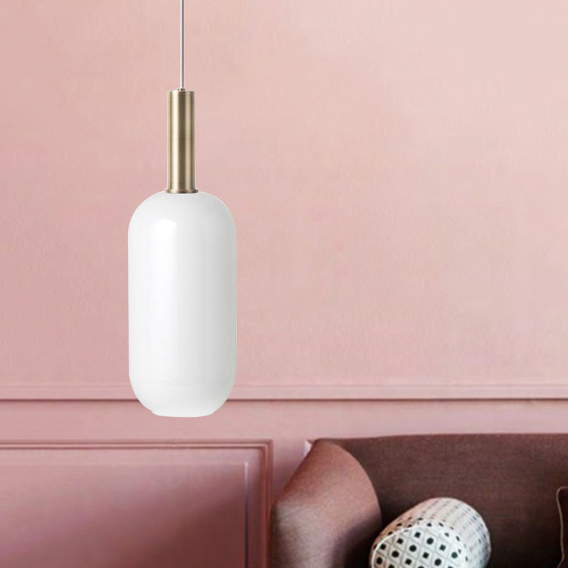 Opal Matte Glass Oblong Ceiling Pendant Minimalist 1 Light Brass Hanging Lamp Kit over Table Clearhalo 'Ceiling Lights' 'Glass shade' 'Glass' 'Modern Pendants' 'Modern' 'Pendant Lights' 'Pendants' Lighting' 1454899