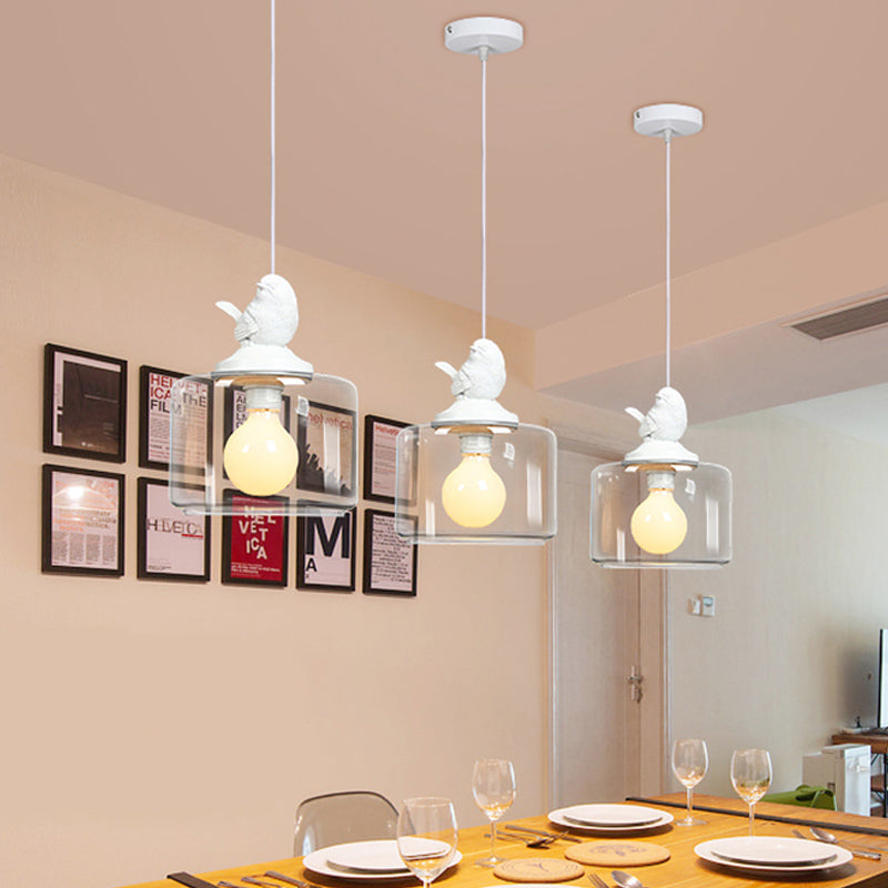 Drum Shaped Dinette Pendant Lamp Clear Glass 1 Bulb Modern Hanging Lamp Kit with White Bird Top Clearhalo 'Ceiling Lights' 'Glass shade' 'Glass' 'Modern Pendants' 'Modern' 'Pendant Lights' 'Pendants' Lighting' 1454939