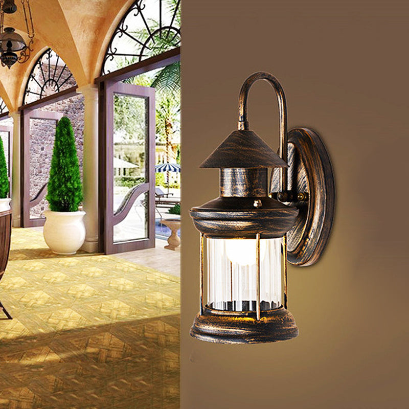 Metallic Lantern Wall Mount Lighting Coastal 1 Bulb Corner Wall Lamp Sconce with Curvy Arm in Brass Clearhalo 'Art deco wall lights' 'Cast Iron' 'Glass' 'Industrial wall lights' 'Industrial' 'Middle century wall lights' 'Modern' 'Rustic wall lights' 'Tiffany' 'Traditional wall lights' 'Wall Lamps & Sconces' 'Wall Lights' Lighting' 1473051