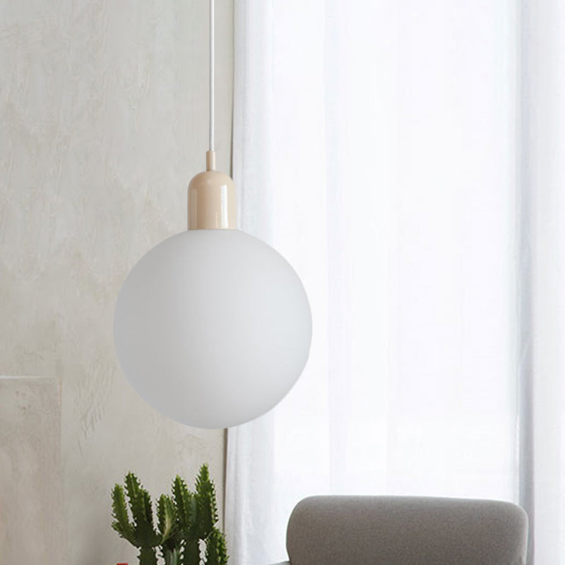 Simple Spherical Opal Glass Drop Pendant 1-Light Hanging Ceiling Light with Red/White/Green Cap White Clearhalo 'Ceiling Lights' 'Glass shade' 'Glass' 'Modern Pendants' 'Modern' 'Pendant Lights' 'Pendants' Lighting' 1475203