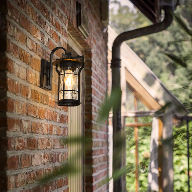 Clear Glass Black Sconce Light Square/Rectangle 1-Light Coastal Wall Lamp Fixture with Iron Cage Black Rectangle Clearhalo 'Art deco wall lights' 'Cast Iron' 'Glass' 'Industrial wall lights' 'Industrial' 'Middle century wall lights' 'Modern' 'Rustic wall lights' 'Tiffany' 'Traditional wall lights' 'Wall Lamps & Sconces' 'Wall Lights' Lighting' 149969