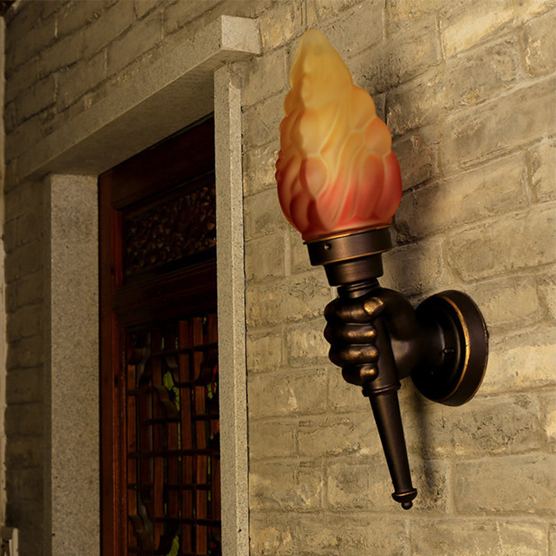 Black 1 Bulb Sconce Light Factory Amber Glass Torch Wall Mounted Lighting with Hand Decor Clearhalo 'Art deco wall lights' 'Cast Iron' 'Glass' 'Industrial wall lights' 'Industrial' 'Middle century wall lights' 'Modern' 'Rustic wall lights' 'Tiffany' 'Traditional wall lights' 'Wall Lamps & Sconces' 'Wall Lights' Lighting' 1637044