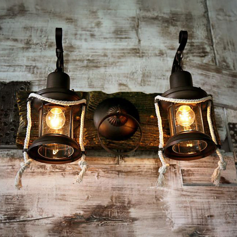 Lantern Clear Glass Wall Lighting Ideas Rustic 2 Bulbs Bar Wall Mount Light in Black Black Clearhalo 'Art deco wall lights' 'Cast Iron' 'Glass' 'Industrial wall lights' 'Industrial' 'Middle century wall lights' 'Modern' 'Rustic wall lights' 'Tiffany' 'Traditional wall lights' 'Wall Lamps & Sconces' 'Wall Lights' Lighting' 1687827