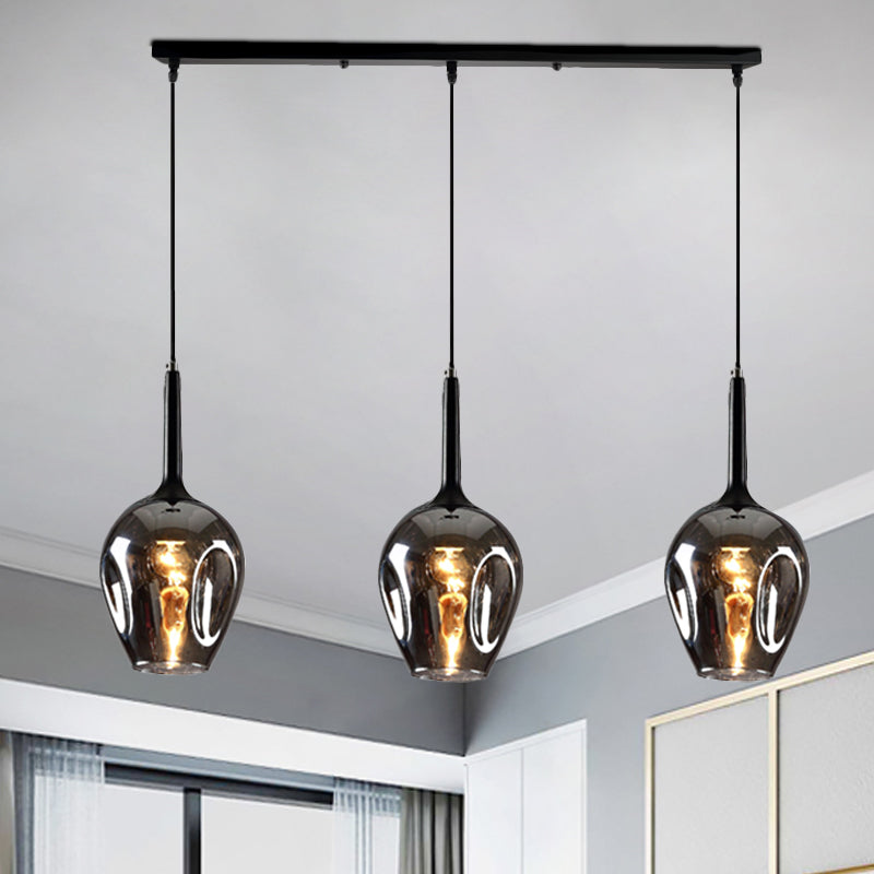 Tulip Cluster Pendant Lamp with Linear Design Modern Amber/Smoke/Blue Glass 3 Lights Black Ceiling Hung Light Smoke Gray Clearhalo 'Ceiling Lights' 'Chandeliers' 'Glass shade' 'Glass' 'Modern Pendants' 'Modern' 'Pendant Lights' 'Pendants' Lighting' 1903452