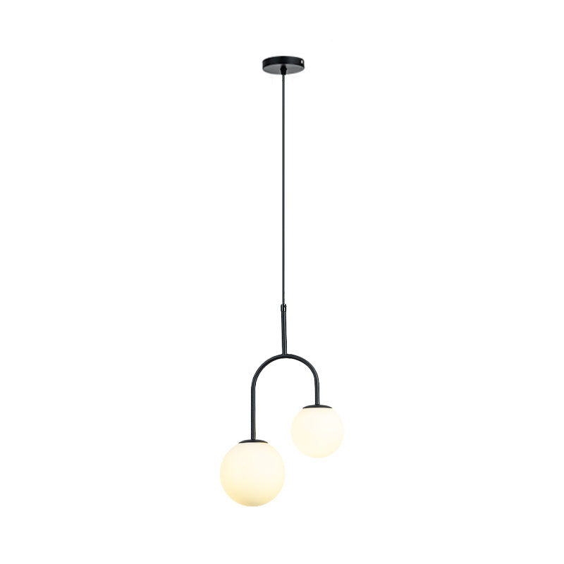 White Glass Global Hanging Pendant Light Modern 2 Heads Black/Gold Suspension Lamp with Arc Arm Clearhalo 'Ceiling Lights' 'Glass shade' 'Glass' 'Modern Pendants' 'Modern' 'Pendant Lights' 'Pendants' Lighting' 1903591