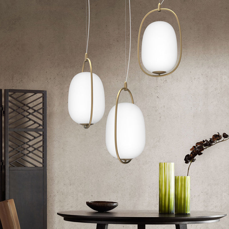 Postmodern Single Ceiling Hang Light Gold Cocoon Shaped Pendant Lamp with Frame and White Glass Shade, Warm/White/3 Color Light White Clearhalo 'Ceiling Lights' 'Modern Pendants' 'Modern' 'Pendant Lights' 'Pendants' Lighting' 1936818