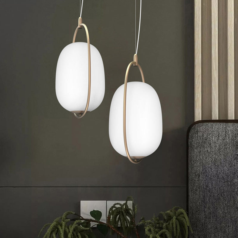 Postmodern Single Ceiling Hang Light Gold Cocoon Shaped Pendant Lamp with Frame and White Glass Shade, Warm/White/3 Color Light Clearhalo 'Ceiling Lights' 'Modern Pendants' 'Modern' 'Pendant Lights' 'Pendants' Lighting' 1936820