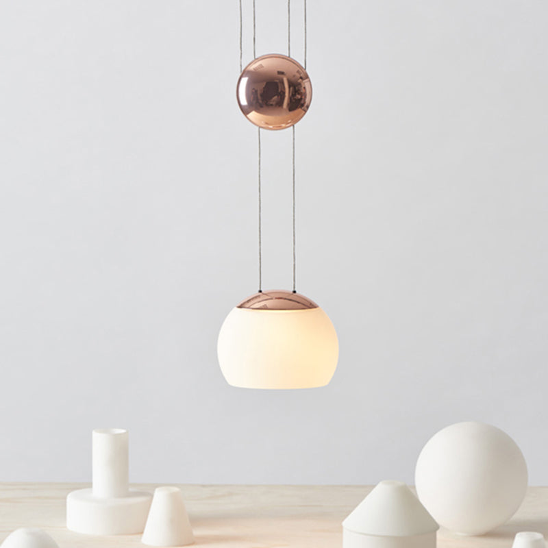 Hemisphere Frosted Glass Pendant Light Kit Novelty Postmodern Single Rose Gold/Gold Ceiling Hang Light with Mobile Ball Rose Gold Clearhalo 'Ceiling Lights' 'Modern Pendants' 'Modern' 'Pendant Lights' 'Pendants' Lighting' 1936994