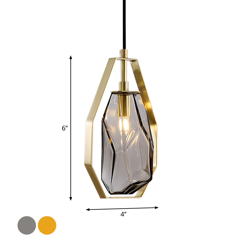 Gem Amber/Smoke Grey Glass Hanging Lamp Postmodernist 1 Light Brass Ceiling Pendant with Heptagon Frame Clearhalo 'Ceiling Lights' 'Glass shade' 'Glass' 'Modern Pendants' 'Modern' 'Pendant Lights' 'Pendants' Lighting' 1937309