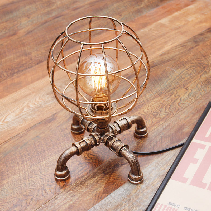 Metal Ball Cage Table Lamp with Pipe-Like Base Industrial Style 1 Bulb Bedroom Mini Table Light in Antique Bronze Antique Bronze Clearhalo 'Lamps' 'Table Lamps' Lighting' 195913