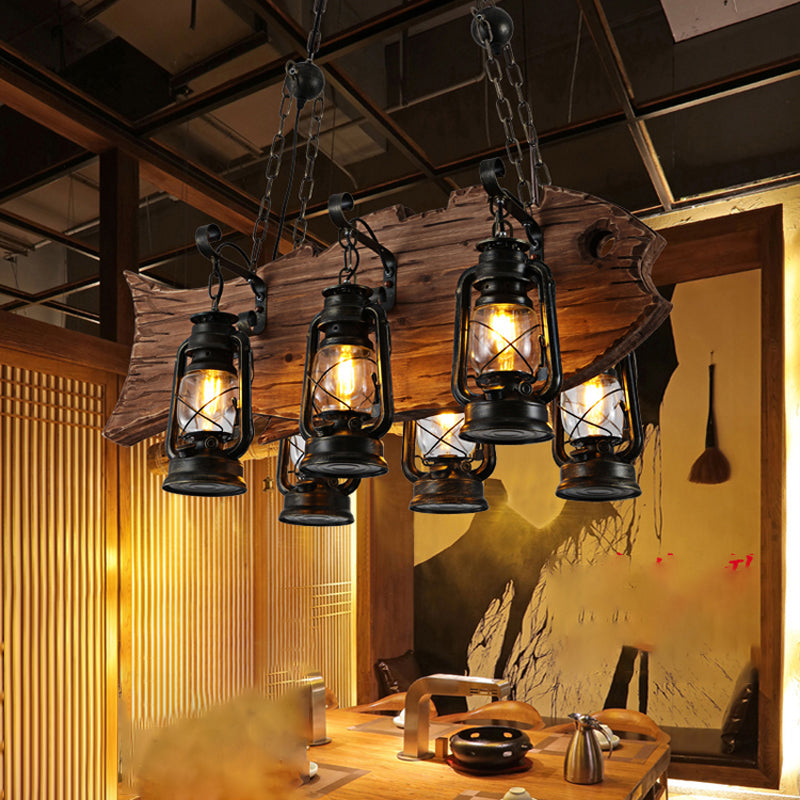 Black Kerosene Chandelier Light Coastal Clear Glass 6 Heads Restaurant Pendant Lighting with Wood Fish Black Clearhalo 'Cast Iron' 'Ceiling Lights' 'Chandeliers' 'Industrial Chandeliers' 'Industrial' 'Metal' 'Middle Century Chandeliers' 'Rustic Chandeliers' 'Tiffany' Lighting' 2011389