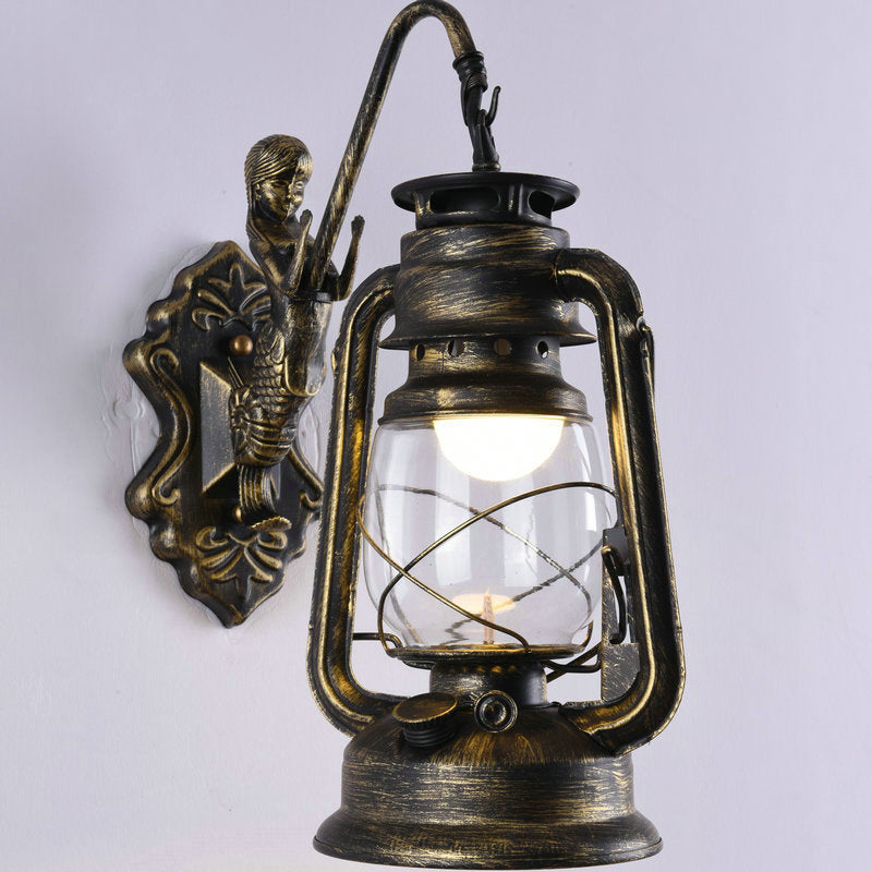 Clear Glass Kerosene Wall Light Fixture Nautical 1 Head Restaurant Wall Sconce with Curved Arm Clearhalo 'Art deco wall lights' 'Cast Iron' 'Glass' 'Industrial wall lights' 'Industrial' 'Middle century wall lights' 'Modern' 'Rustic wall lights' 'Tiffany' 'Traditional wall lights' 'Wall Lamps & Sconces' 'Wall Lights' Lighting' 2011503