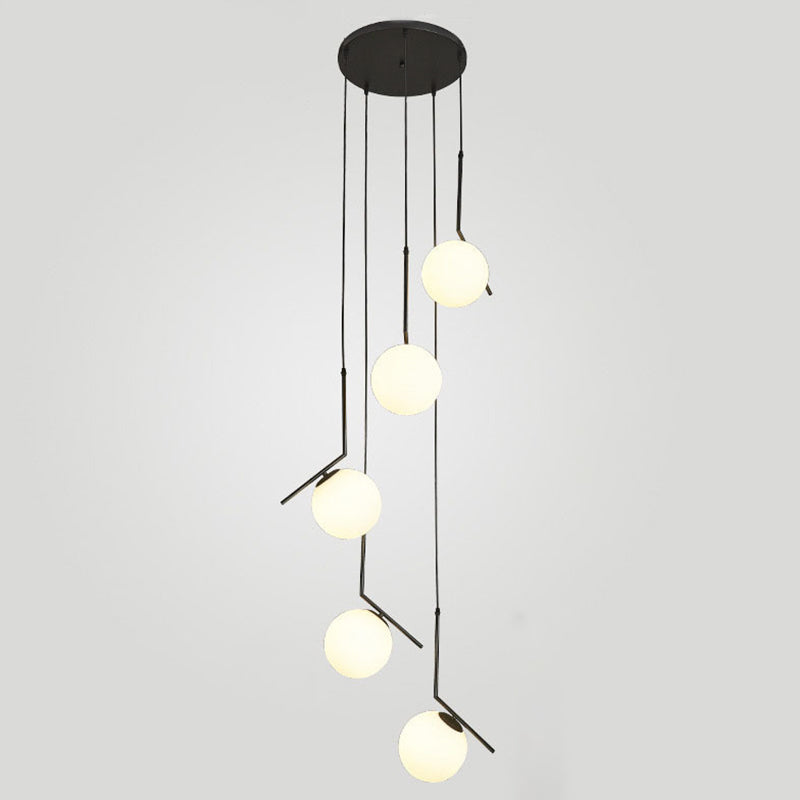 Minimalist Sphere Multi Light Pendant Opal Glass Living Room Suspension Lamp with Metal Arm 5 Black Clearhalo 'Ceiling Lights' 'Modern Pendants' 'Modern' 'Pendant Lights' 'Pendants' Lighting' 2025357