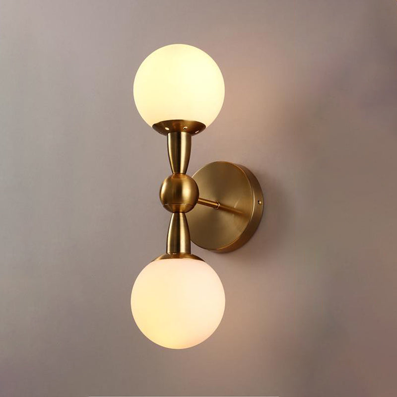 Spherical Wall Lighting Contemporary White Glass Bedside Wall Light Fixture in Gold Clearhalo 'Cast Iron' 'Glass' 'Industrial' 'Modern wall lights' 'Modern' 'Tiffany' 'Traditional wall lights' 'Wall Lamps & Sconces' 'Wall Lights' Lighting' 2038860