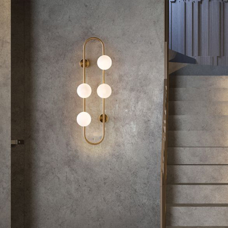 Gold Oblong Sconce Modernity 4 Heads Metal Wall Light Fixture with Orb Milky Glass Shade Gold Clearhalo 'Cast Iron' 'Glass' 'Industrial' 'Modern wall lights' 'Modern' 'Tiffany' 'Traditional wall lights' 'Wall Lamps & Sconces' 'Wall Lights' Lighting' 2038926