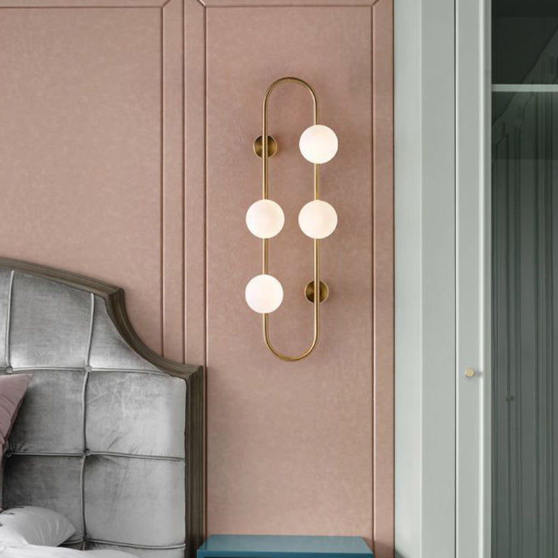 Gold Oblong Sconce Modernity 4 Heads Metal Wall Light Fixture with Orb Milky Glass Shade Clearhalo 'Cast Iron' 'Glass' 'Industrial' 'Modern wall lights' 'Modern' 'Tiffany' 'Traditional wall lights' 'Wall Lamps & Sconces' 'Wall Lights' Lighting' 2038928