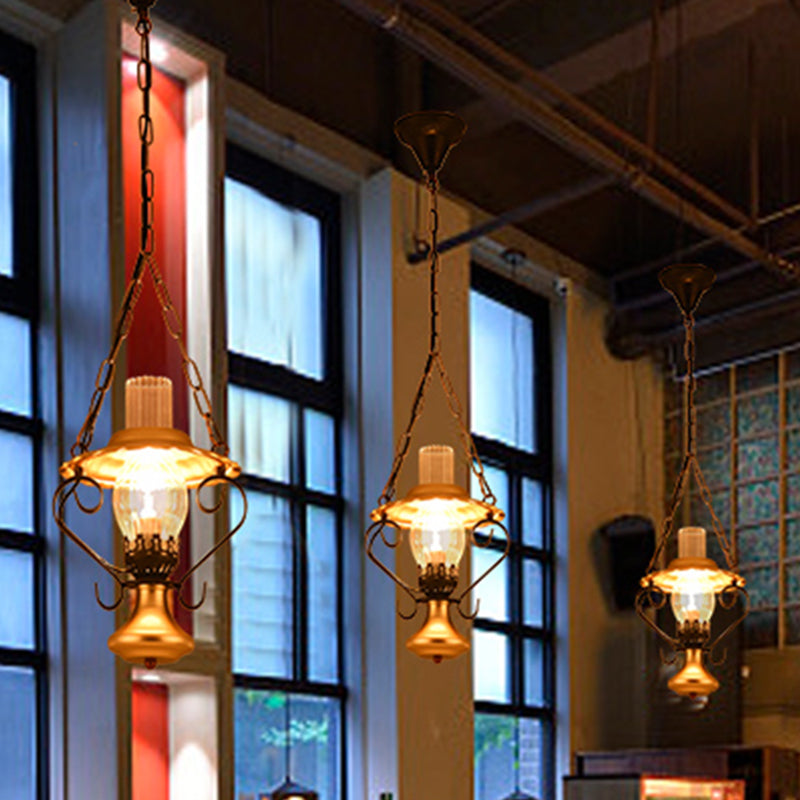 Iron and Glass Lantern Ceiling Pendant Industrial Single Light Bedroom Chain Hung Pendant in Brass Brass Clearhalo 'Art Deco Pendants' 'Cast Iron' 'Ceiling Lights' 'Ceramic' 'Crystal' 'Industrial Pendants' 'Industrial' 'Metal' 'Middle Century Pendants' 'Pendant Lights' 'Pendants' 'Tiffany' Lighting' 205087