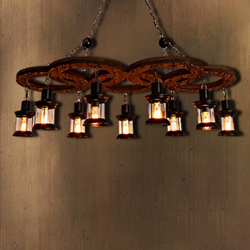 Lantern Clear Glass Light Chandelier Coastal Multi Light Living Room Pendant Lighting in Black with Wooden Shelf Black Clearhalo 'Cast Iron' 'Ceiling Lights' 'Chandeliers' 'Industrial Chandeliers' 'Industrial' 'Metal' 'Middle Century Chandeliers' 'Rustic Chandeliers' 'Tiffany' Lighting' 205903