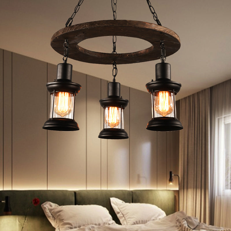 3/6-Bulb Ceiling Lamp with Lantern Shade Clear Glass Industrial Dining Room Chandelier Pendant Light in Black 3 Black Clearhalo 'Carpenter Chandeliers' 'Ceiling Lights' 'Chandeliers' 'Industrial Chandeliers' 'Industrial' 'Middle Century Chandeliers' 'Modern' 'Tiffany' Lighting' 207693