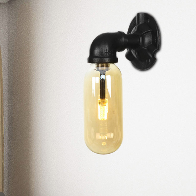 Capsule Amber Glass Sconce Lighting Industrial 1 Bulb Indoor Wall Mounted Lamp in Black with Pipe Design Black A Clearhalo 'Art deco wall lights' 'Cast Iron' 'Glass' 'Industrial wall lights' 'Industrial' 'Middle century wall lights' 'Modern' 'Rustic wall lights' 'Tiffany' 'Traditional wall lights' 'Wall Lamps & Sconces' 'Wall Lights' Lighting' 208380