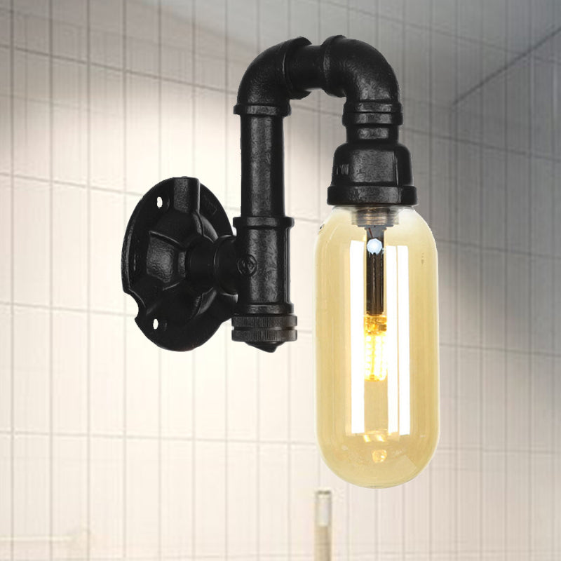 Capsule Amber Glass Sconce Lighting Industrial 1 Bulb Indoor Wall Mounted Lamp in Black with Pipe Design Clearhalo 'Art deco wall lights' 'Cast Iron' 'Glass' 'Industrial wall lights' 'Industrial' 'Middle century wall lights' 'Modern' 'Rustic wall lights' 'Tiffany' 'Traditional wall lights' 'Wall Lamps & Sconces' 'Wall Lights' Lighting' 208384