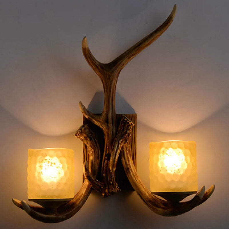 Brown Cylinder Wall Lamp Rustic Frost Glass 2 Bulbs Living Room Wall Light Fixture with Decorative Antler Brown Clearhalo 'Wall Lamps & Sconces' 'Wall Lights' Lighting' 2135822