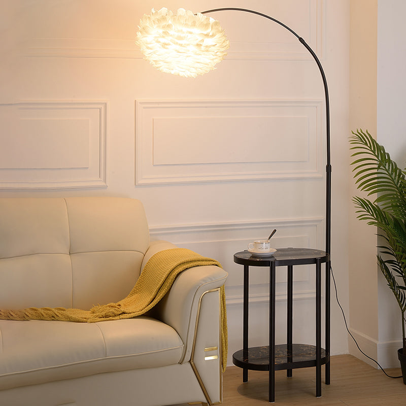 Arc Arm Standing Light Modern Metallic 1-Light Living Room Floor Lighting with Feather Shade and 2-Tier Shelf Black Oval Clearhalo 'Floor Lamps' 'Lamps' Lighting' 2196993