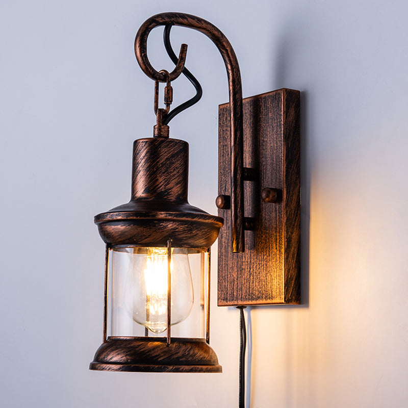 Iron Lantern Wall Light Retro Style Single-Bulb Restaurant Wall Lighting Fixture in Bronze Clearhalo 'Art deco wall lights' 'Cast Iron' 'Glass' 'Industrial wall lights' 'Industrial' 'Middle century wall lights' 'Modern' 'Rustic wall lights' 'Tiffany' 'Traditional wall lights' 'Wall Lamps & Sconces' 'Wall Lights' Lighting' 2216673