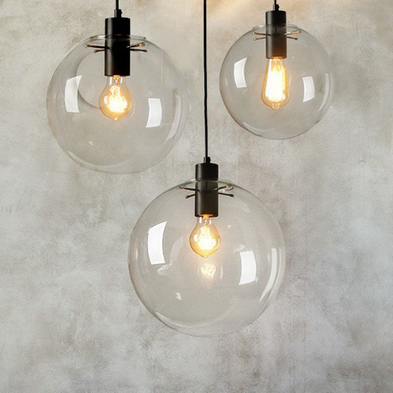 Clear Glass Globe Hanging Light Minimalistic 1-Light Black Pendant Lighting for Restaurant Clearhalo 'Ceiling Lights' 'Modern Pendants' 'Modern' 'Pendant Lights' 'Pendants' Lighting' 2254752