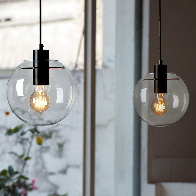 Clear Glass Globe Hanging Light Minimalistic 1-Light Black Pendant Lighting for Restaurant Clearhalo 'Ceiling Lights' 'Modern Pendants' 'Modern' 'Pendant Lights' 'Pendants' Lighting' 2254753