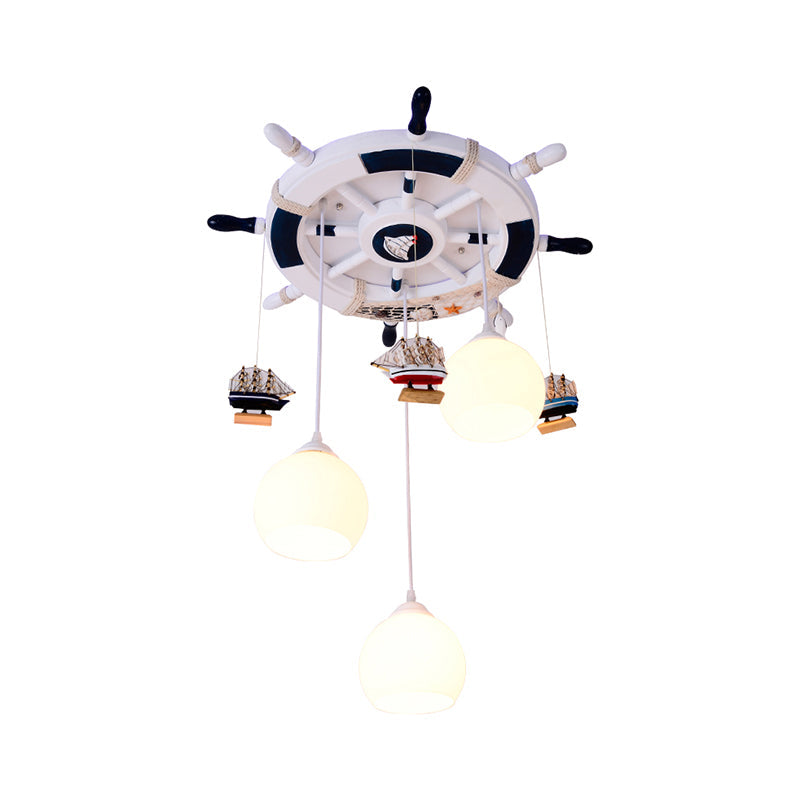 Globe Flush Ceiling Light Cartoon Cream Glass 3 Bulbs Child Room LED Flush Mount Lighting with Rudder Decor Clearhalo 'Ceiling Lights' 'Close To Ceiling Lights' 'Close to ceiling' 'Flush mount' Lighting' 2268504