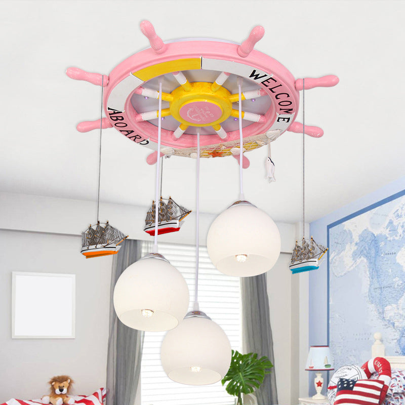 Globe Flush Ceiling Light Cartoon Cream Glass 3 Bulbs Child Room LED Flush Mount Lighting with Rudder Decor Pink Clearhalo 'Ceiling Lights' 'Close To Ceiling Lights' 'Close to ceiling' 'Flush mount' Lighting' 2268505