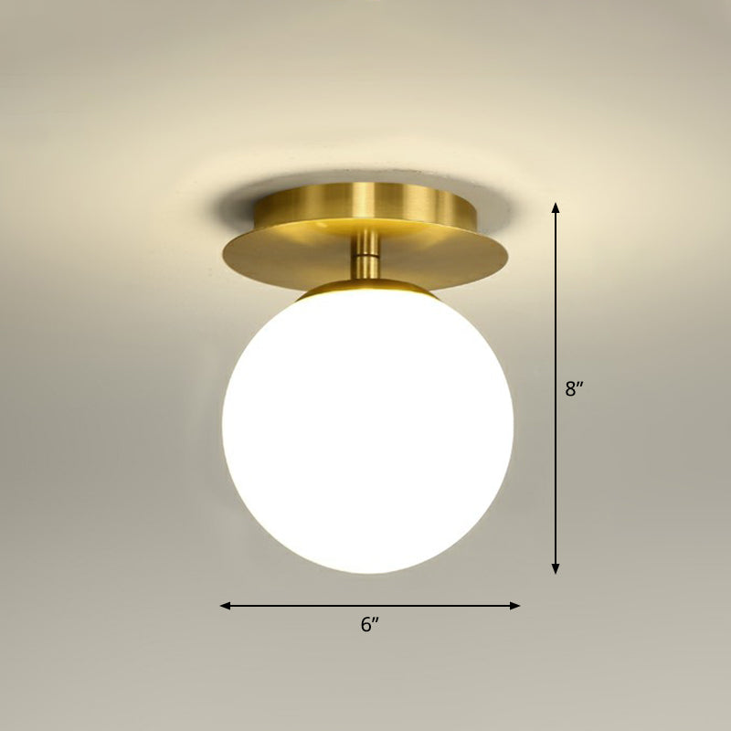 Ball Foyer Semi Flush Mount Lighting Glass 1-Light Postmodern Ceiling Light in Brass Clearhalo 'Ceiling Lights' 'Close To Ceiling Lights' 'Close to ceiling' 'Semi-flushmount' Lighting' 2353949