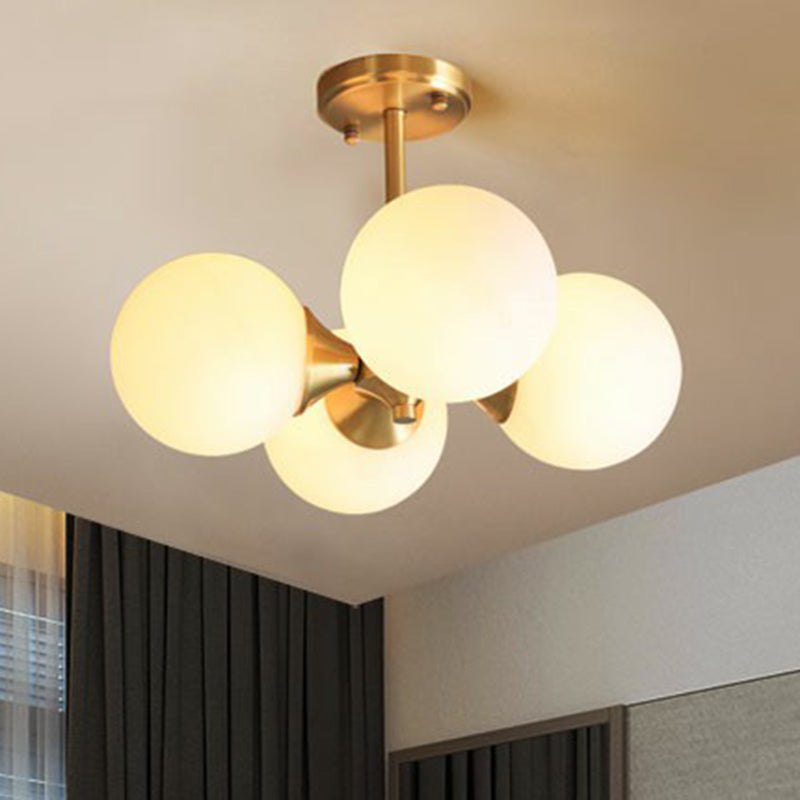 Brass Globe Flush Mount Lighting Postmodern 4 Heads Opal Glass Semi Flush Light for Bedroom Clearhalo 'Ceiling Lights' 'Chandeliers' 'Modern Chandeliers' 'Modern' Lighting' 2354232