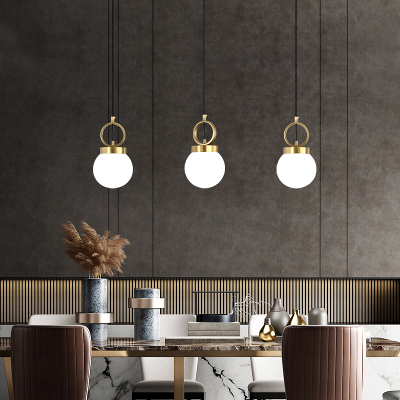 Ball Pendulum Light Simple Opal Glass Single Dining Room Pendant Lamp with Gold Ring Top Clearhalo 'Ceiling Lights' 'Modern Pendants' 'Modern' 'Pendant Lights' 'Pendants' Lighting' 2356921