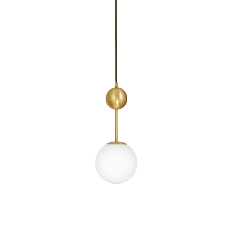 Ball Bedside Hanging Light Opaline Glass 1-Light Minimalist Suspension Pendant in Brass Clearhalo 'Ceiling Lights' 'Modern Pendants' 'Modern' 'Pendant Lights' 'Pendants' Lighting' 2356928