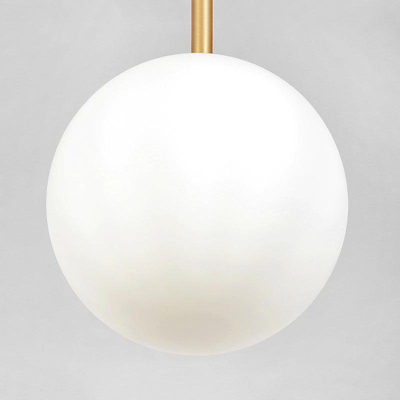 Ball Bedside Hanging Light Opaline Glass 1-Light Minimalist Suspension Pendant in Brass Clearhalo 'Ceiling Lights' 'Modern Pendants' 'Modern' 'Pendant Lights' 'Pendants' Lighting' 2356929