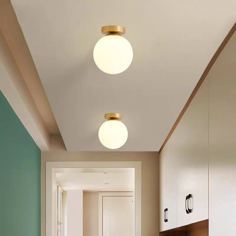 Minimalism Spherical Ceiling Flush Light White Glass Single Entryway Flush Mount Light in Gold Gold Clearhalo 'Ceiling Lights' 'Close To Ceiling Lights' 'Close to ceiling' 'Flush mount' Lighting' 2357086