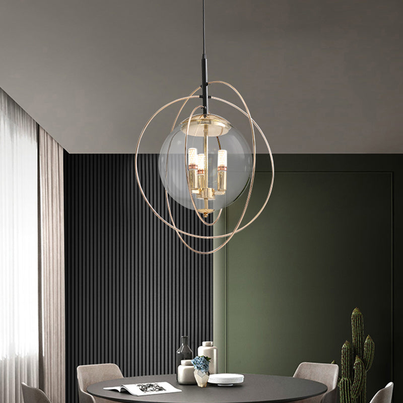 Glass Orbit Globe Pendant Light Postmodern 3 Bulbs Chandelier Lighting Fixture for Restaurant Clearhalo 'Ceiling Lights' 'Chandeliers' 'Clear' 'Industrial' 'Modern Chandeliers' 'Modern' 'Tiffany' 'Traditional Chandeliers' Lighting' 2357209