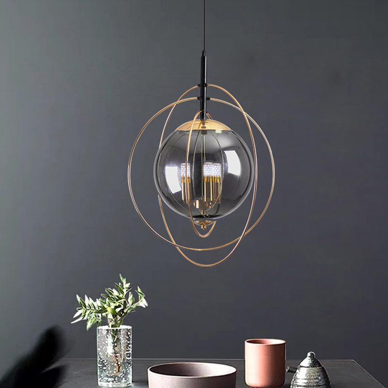 Glass Orbit Globe Pendant Light Postmodern 3 Bulbs Chandelier Lighting Fixture for Restaurant Clearhalo 'Ceiling Lights' 'Chandeliers' 'Clear' 'Industrial' 'Modern Chandeliers' 'Modern' 'Tiffany' 'Traditional Chandeliers' Lighting' 2357212