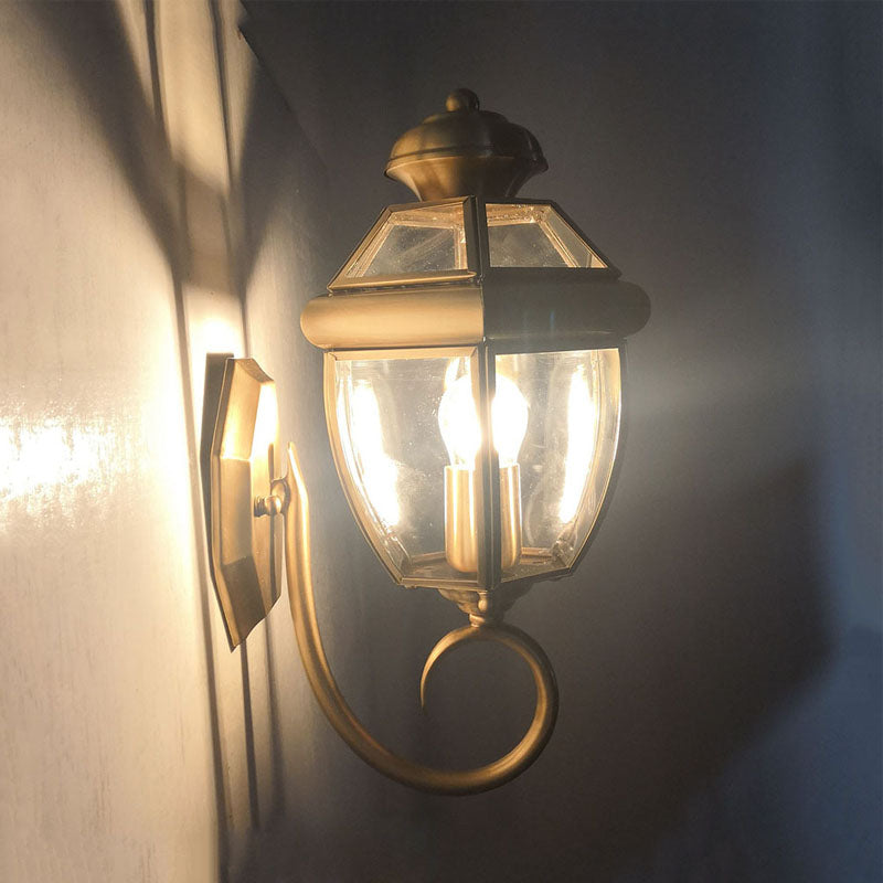 Traditional Urn Sconce Clear Glass 1 Bulb Wall Mounted Light Fixture in Brass with Curved Arm Brass Clearhalo 'Wall Lamps & Sconces' 'Wall Lights' Lighting' 238607