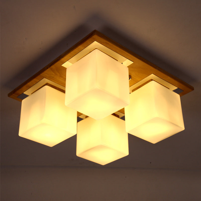 Cube Shape Semi Flush Ceiling Light Nordic Opal Glass 4-Light Bedroom Flush Mount Lamp in Wood Clearhalo 'Ceiling Lights' 'Close To Ceiling Lights' 'Close to ceiling' 'Flush mount' Lighting' 2390344