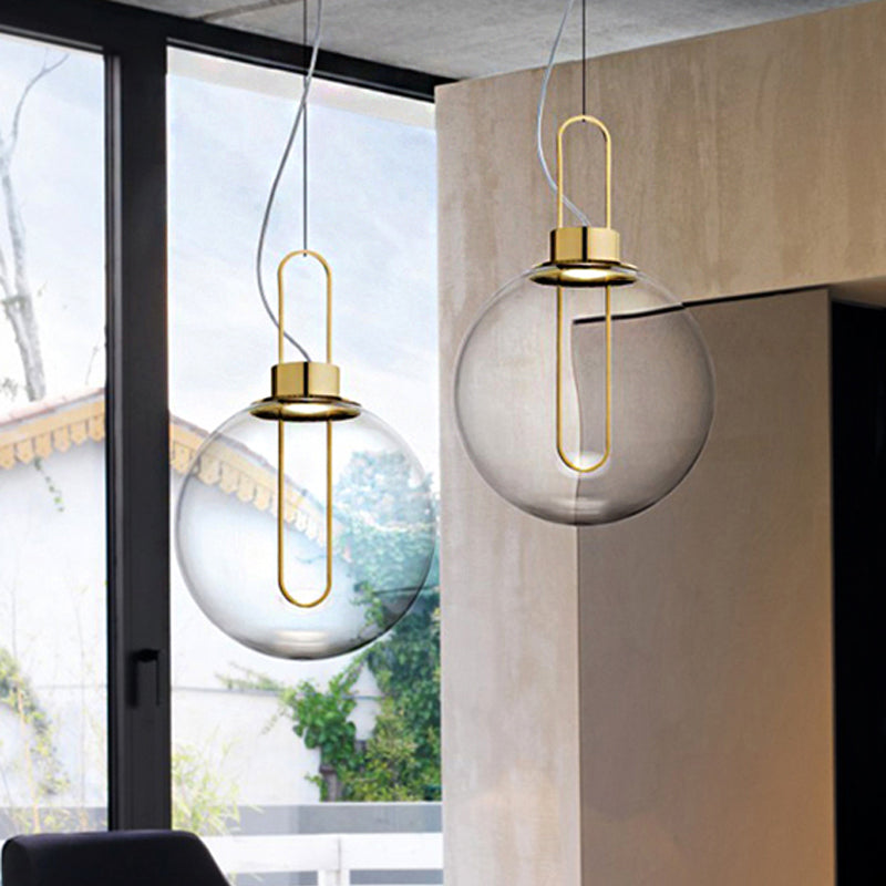 Sphere Pendant Modernist Clear Glass 1 Light Gold/Chrome/Rose Gold Hanging Ceiling Light in White Light Clearhalo 'Ceiling Lights' 'Chandeliers' 'Glass shade' 'Glass' 'Modern Pendants' 'Modern' 'Pendant Lights' 'Pendants' Lighting' 246844