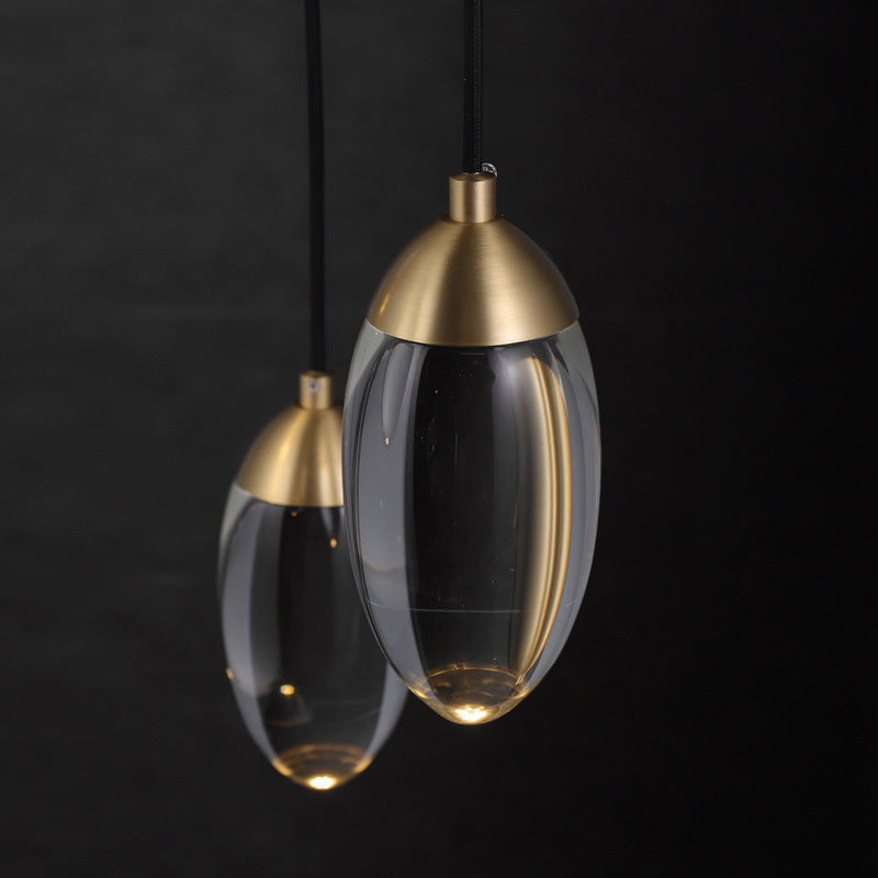 Oval Mini Suspension Lighting Minimalist Crystal LED Bedroom Ceiling Pendant in Brass Clearhalo 'Ceiling Lights' 'Modern Pendants' 'Modern' 'Pendant Lights' 'Pendants' Lighting' 2593227