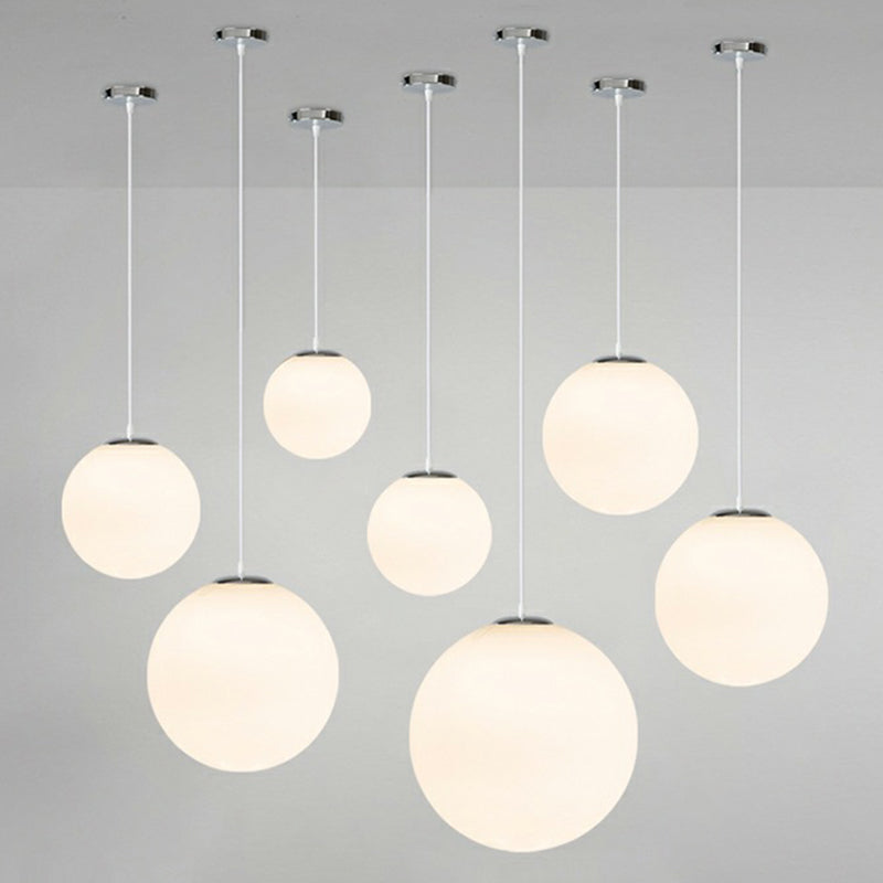 1 Light Ball Hanging Light Fixtures Modern Simple White Glass Ceiling Pendant for Clothing Store Clearhalo 'Ceiling Lights' 'Pendant Lights' 'Pendants' Lighting' 2629998